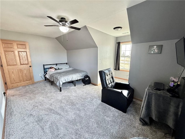 bedroom featuring baseboards, carpet floors, lofted ceiling, and ceiling fan