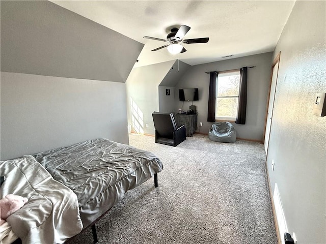 bedroom with carpet, baseboards, visible vents, lofted ceiling, and ceiling fan