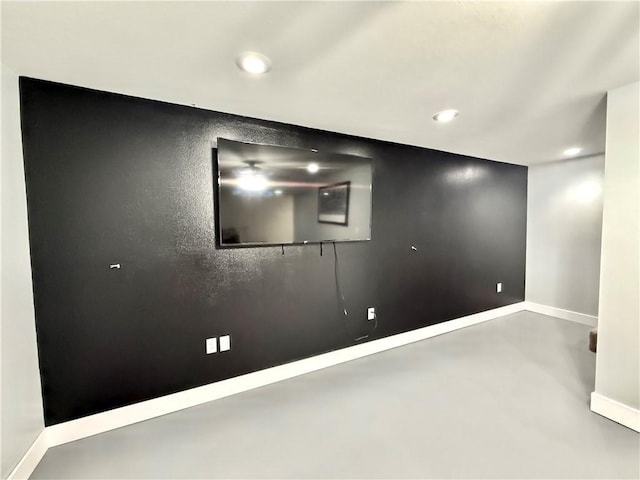 below grade area with recessed lighting and baseboards
