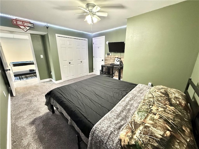 bedroom featuring a ceiling fan, carpet, and baseboards