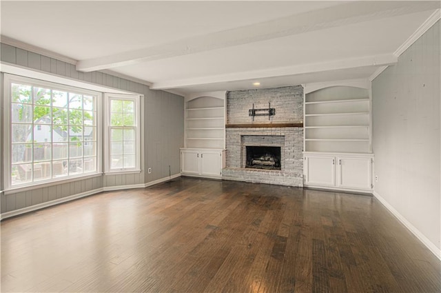 11643 Glen Arbor Ter, Kansas City, MO 64114 - unfurnished living room featuring dark wood-style floors, beam ceiling, baseboards, and a fireplace