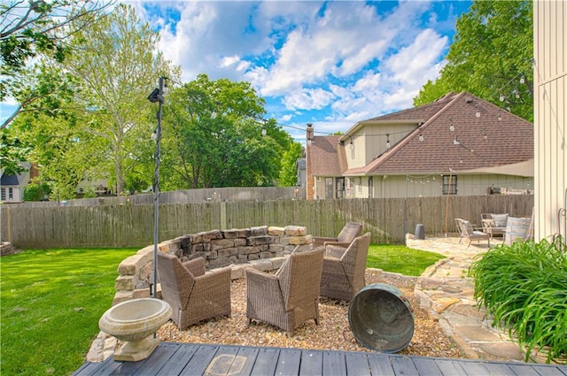 11643 Glen Arbor Ter, Kansas City, MO 64114 - view of patio with an outdoor living space with a fire pit