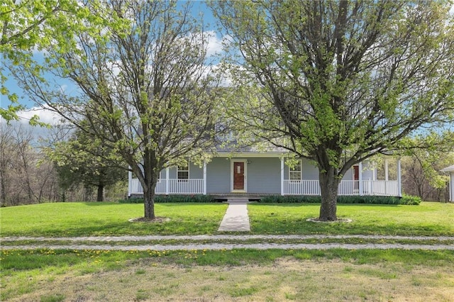 29950 Binder Rd, Green Ridge, MO 65332 - view of front of home featuring covered porch and a front yard
