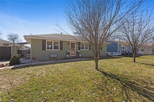 ranch-style house featuring a front yard