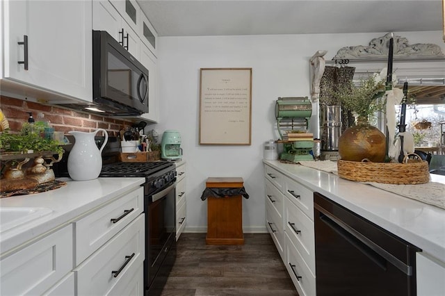 kitchen featuring backsplash, glass insert cabinets, dark wood-style floors, white cabinets, and black appliances