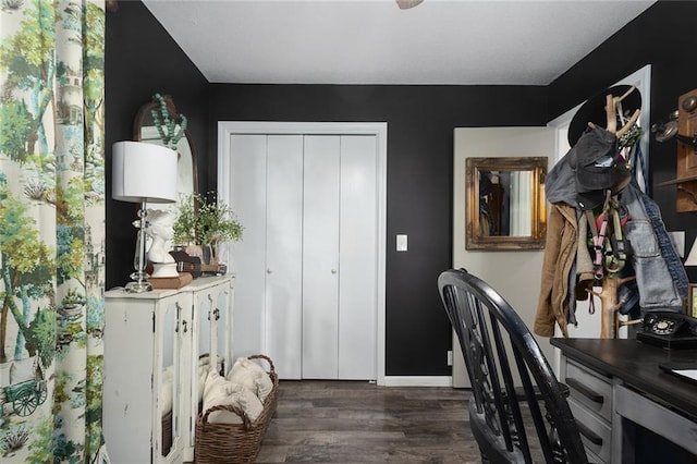 office area with dark wood-style flooring