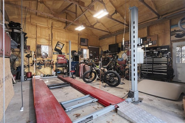 garage with a workshop area