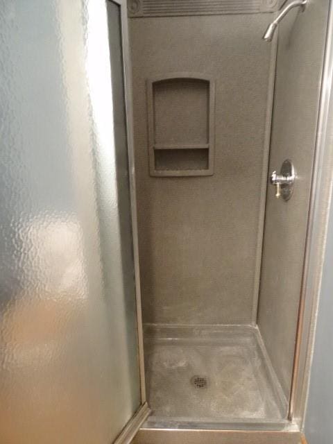 bathroom with a stall shower