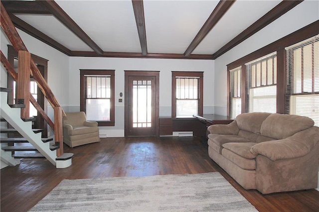 living room with baseboards, wood finished floors, stairway, and beamed ceiling