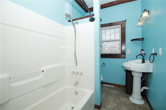 full bath featuring visible vents, tub / shower combination, toilet, baseboards, and a sink