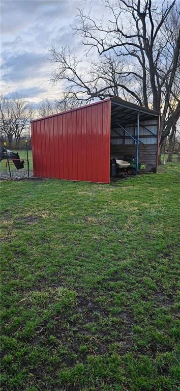 4900 E 219th St, Peculiar, MO 64078 - view of grassy yard featuring an outbuilding and an outdoor structure