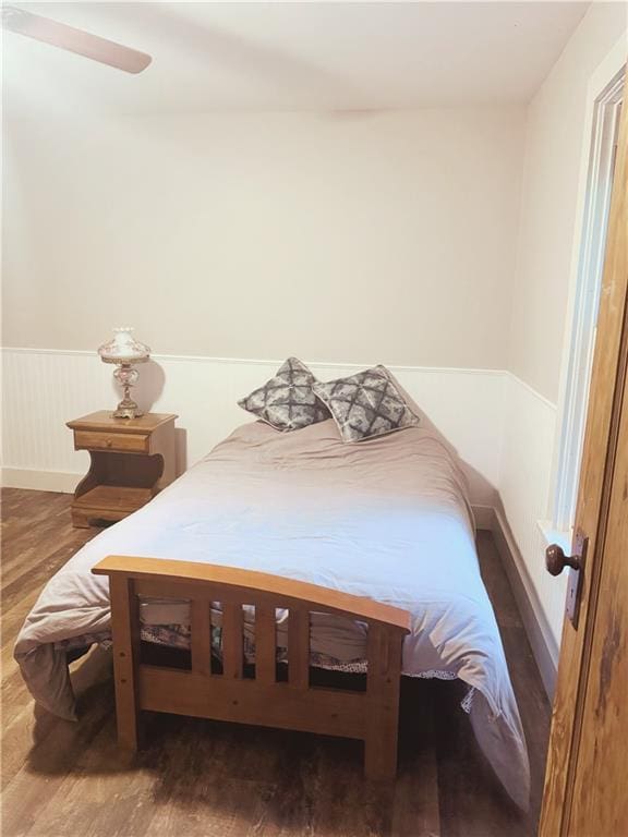 4900 E 219th St, Peculiar, MO 64078 - bedroom featuring wood finished floors and wainscoting