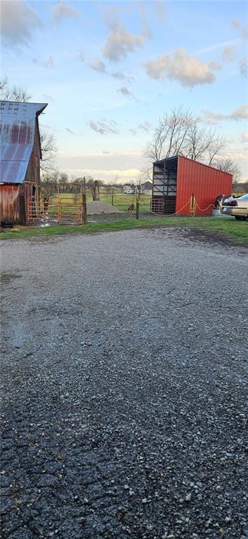 4900 E 219th St, Peculiar, MO 64078 - view of yard with an outbuilding and a barn
