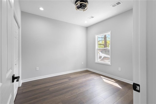 1219 S 36th St, Kansas City, KS 66106 - unfurnished room with baseboards, recessed lighting, visible vents, and dark wood-type flooring