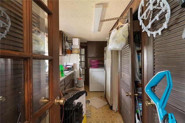 storage area featuring washer / dryer