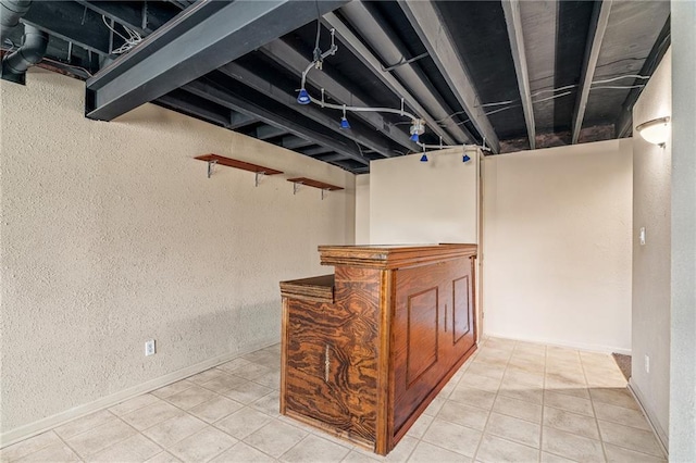 5405 Lakecrest Dr, Shawnee, KS 66218 - indoor dry bar featuring a textured wall and tile patterned floors