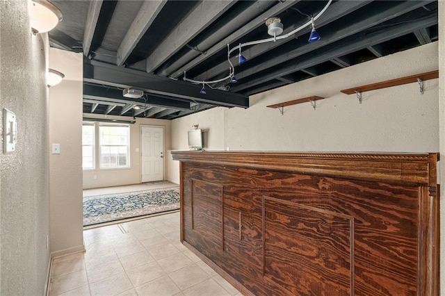 5405 Lakecrest Dr, Shawnee, KS 66218 - hall featuring a textured wall and light tile patterned flooring