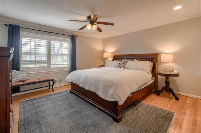 10318 Sagamore Rd, Leawood, KS 66206 - bedroom with light wood-style floors, crown molding, and a ceiling fan