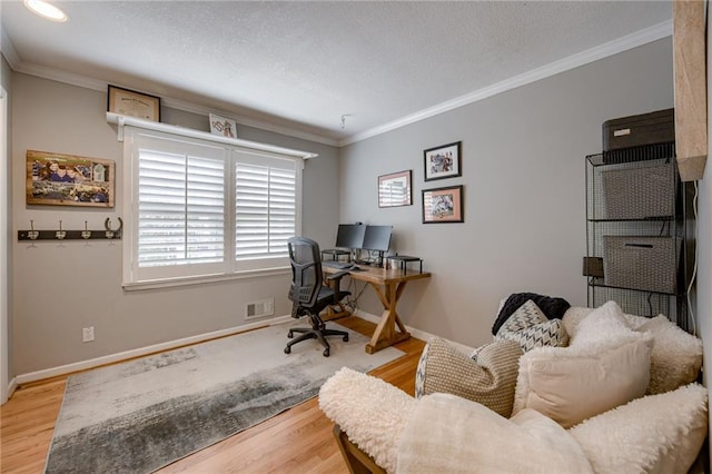 10318 Sagamore Rd, Leawood, KS 66206 - office with wood finished floors, ornamental molding, and a textured ceiling