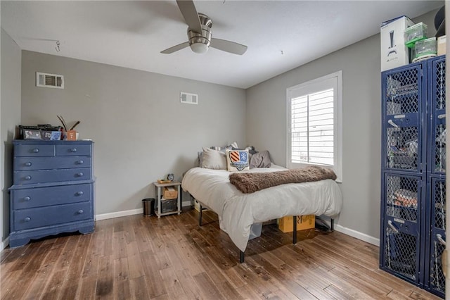 10318 Sagamore Rd, Leawood, KS 66206 - bedroom with hardwood / wood-style floors and a ceiling fan