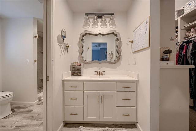 10318 Sagamore Rd, Leawood, KS 66206 - full bathroom featuring vanity, a spacious closet, and walk in shower