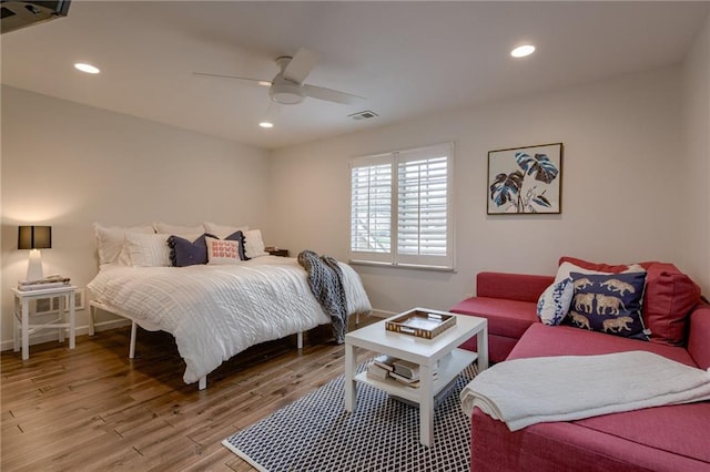 10318 Sagamore Rd, Leawood, KS 66206 - bedroom featuring wood finished floors, ceiling fan, and recessed lighting