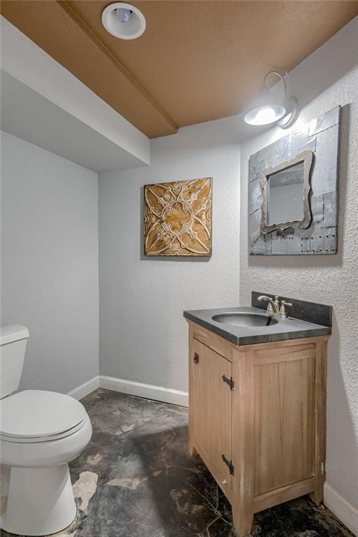 10318 Sagamore Rd, Leawood, KS 66206 - half bathroom with toilet and vanity