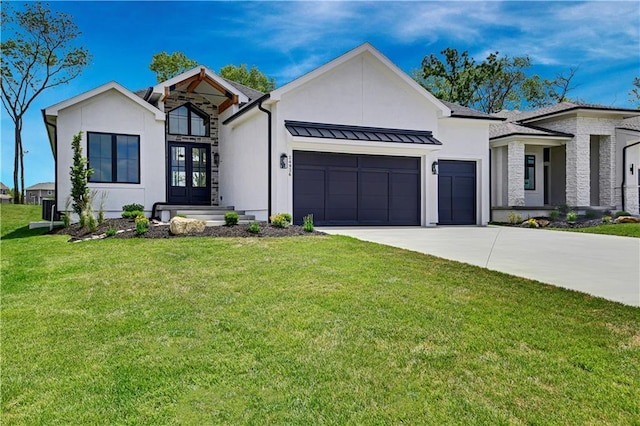 24936 W 98th Pl, Lenexa, KS 66227 - modern farmhouse featuring an attached garage, driveway, stucco siding, and a front lawn