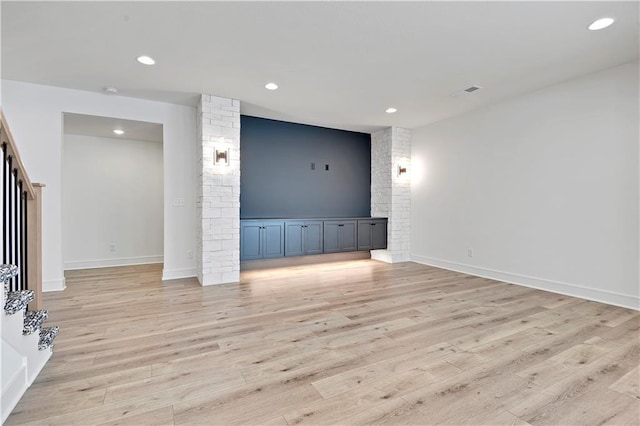 24936 W 98th Pl, Lenexa, KS 66227 - empty room featuring light wood-style flooring, stairway, and recessed lighting
