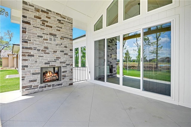 24936 W 98th Pl, Lenexa, KS 66227 - view of patio featuring a fireplace