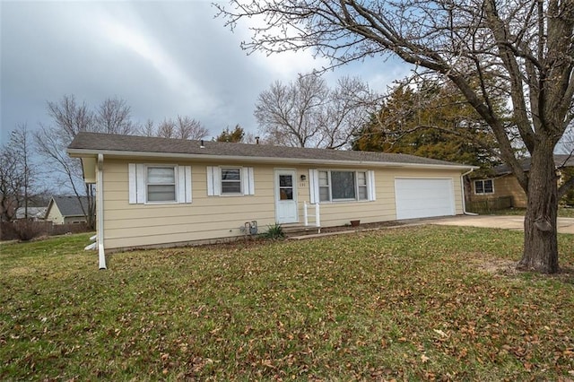 single story home with an attached garage, a front lawn, and driveway