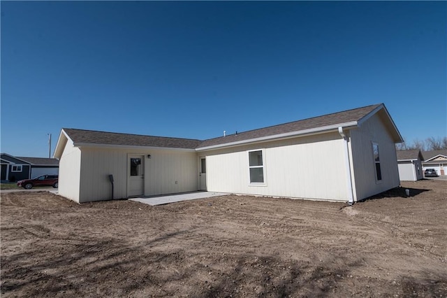 1702 N 2nd St, Neodesha, KS 66757 - rear view of property with a patio area