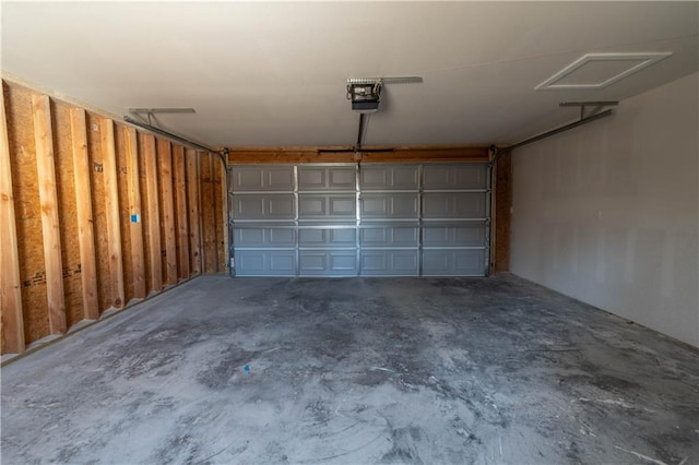1702 N 2nd St, Neodesha, KS 66757 - garage featuring a garage door opener