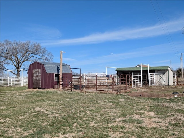 view of yard featuring an outbuilding and an exterior structure
