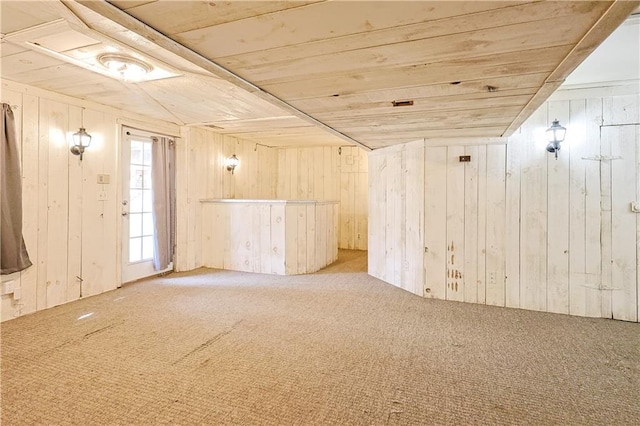 3402 Messanie St, Saint Joseph, MO 64501 - carpeted spare room with wooden ceiling and wood walls