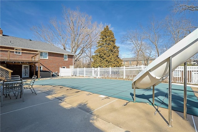 3402 Messanie St, Saint Joseph, MO 64501 - view of pool with fence, a patio area, and a water slide