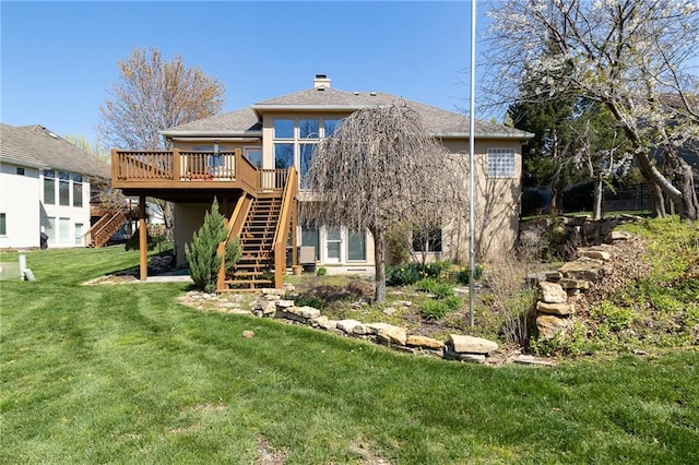3015 SW 9th Ter, Lees Summit, MO 64081 - back of property with a yard, a wooden deck, stucco siding, and stairway