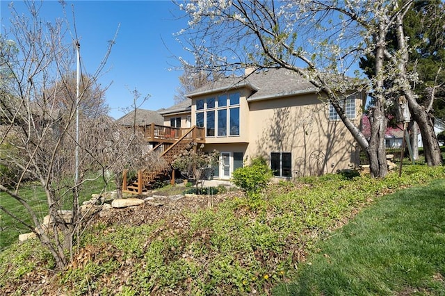 3015 SW 9th Ter, Lees Summit, MO 64081 - back of property with stairway, a deck, and stucco siding