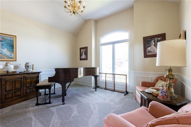 3015 SW 9th Ter, Lees Summit, MO 64081 - living area featuring a notable chandelier, carpet flooring, a wainscoted wall, lofted ceiling, and a decorative wall