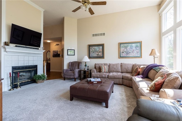 3015 SW 9th Ter, Lees Summit, MO 64081 - living area with ceiling fan, a towering ceiling, carpet, and visible vents