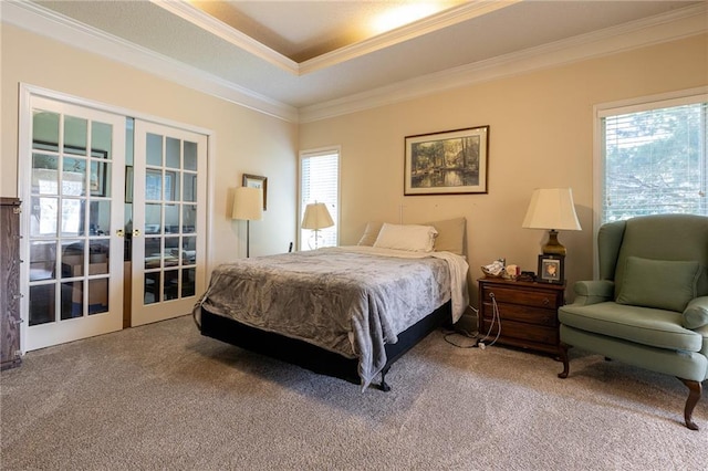 3015 SW 9th Ter, Lees Summit, MO 64081 - bedroom featuring a raised ceiling, french doors, ornamental molding, and carpet