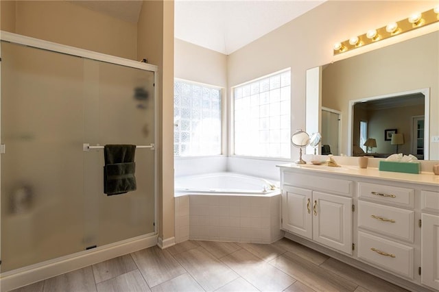 3015 SW 9th Ter, Lees Summit, MO 64081 - bathroom with a bath, vanity, and a stall shower