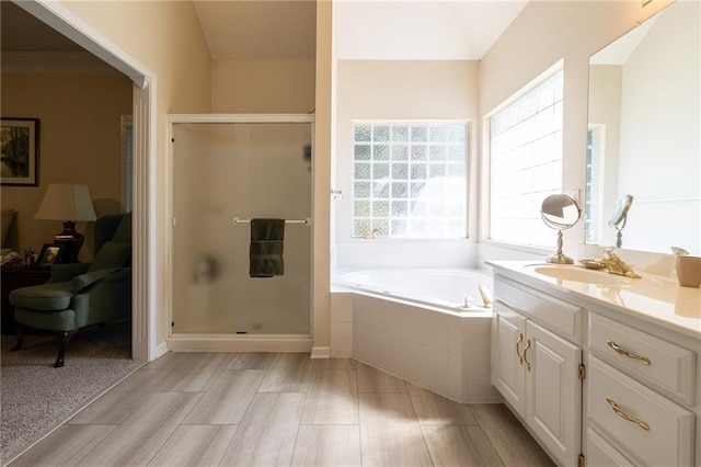 3015 SW 9th Ter, Lees Summit, MO 64081 - bathroom featuring vanity, a stall shower, and a garden tub