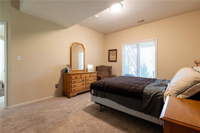 3015 SW 9th Ter, Lees Summit, MO 64081 - bedroom featuring light carpet, baseboards, visible vents, and a textured ceiling