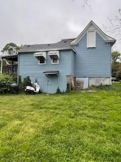 159 S Jewell St, Liberty, MO 64068 - back of property featuring a lawn