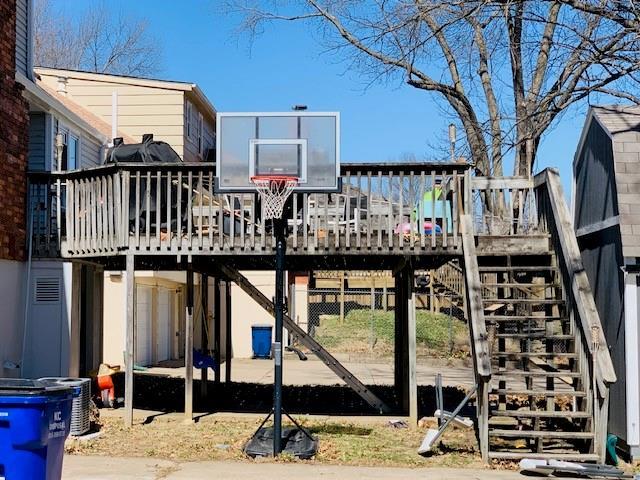 view of basketball court featuring stairs