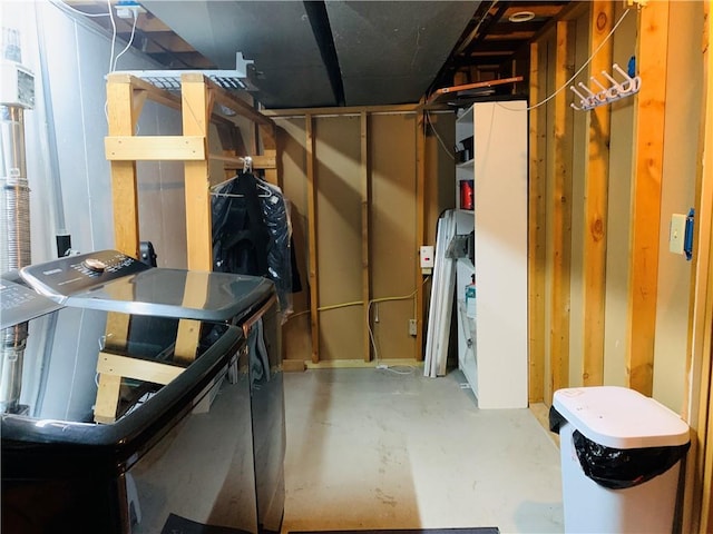 below grade area with washing machine and dryer