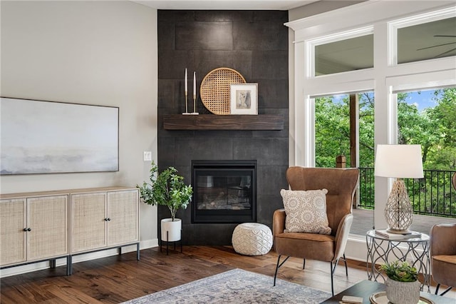 9238 Marion St, Lenexa, KS 66220 - living area featuring wood finished floors and a fireplace