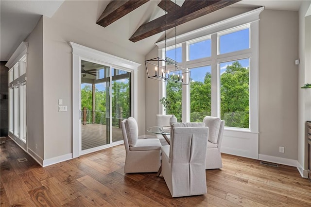 9238 Marion St, Lenexa, KS 66220 - dining room with plenty of natural light, wood finished floors, and baseboards