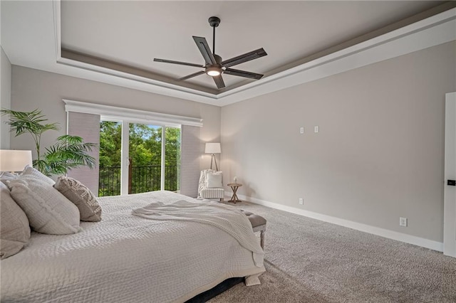 9238 Marion St, Lenexa, KS 66220 - bedroom with a raised ceiling, baseboards, carpet flooring, and ceiling fan
